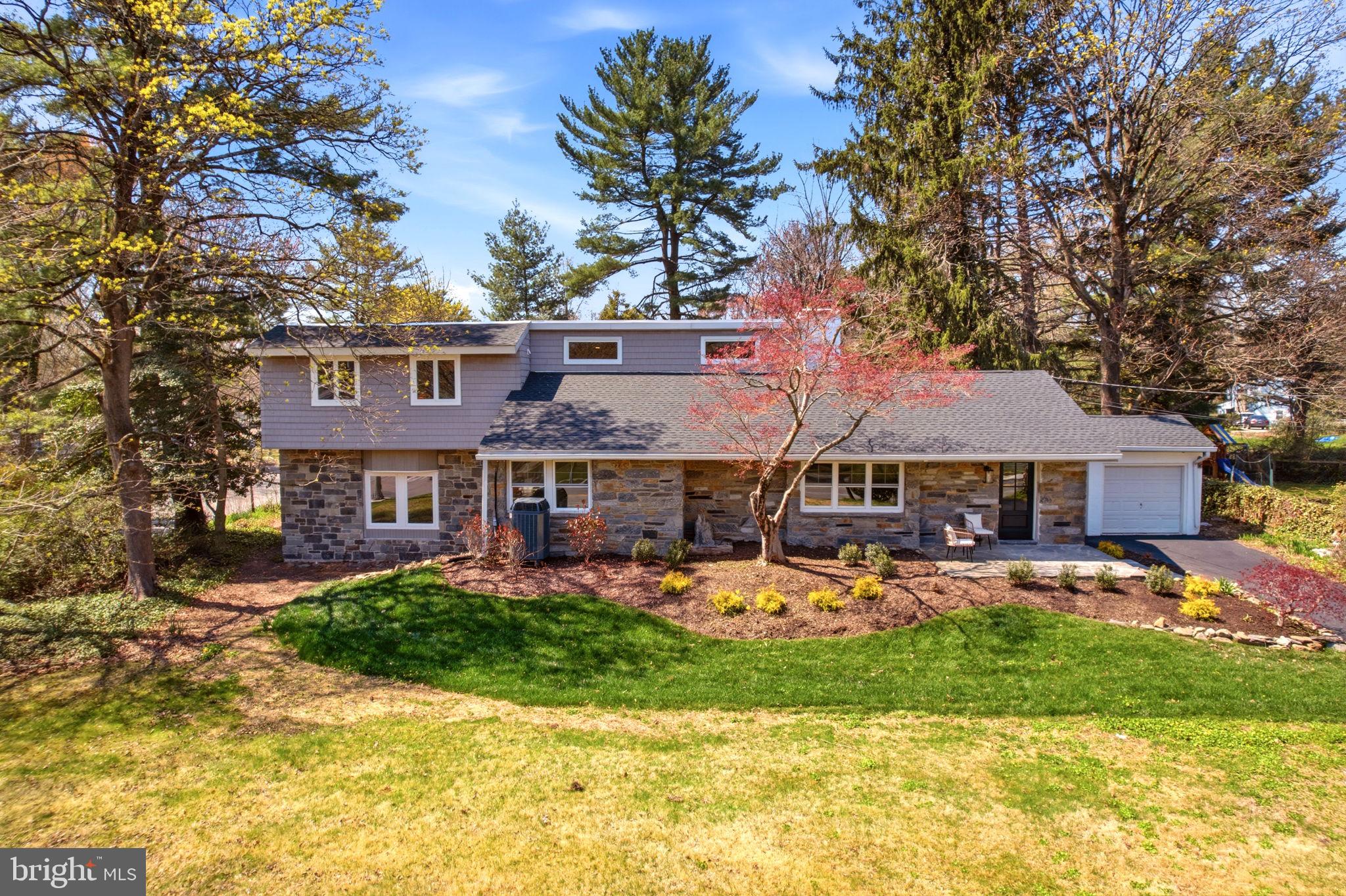 409 South Providence Road Wallingford, PA 19086 - Photo 94 of 106 Charming home nestled in lush greenery.