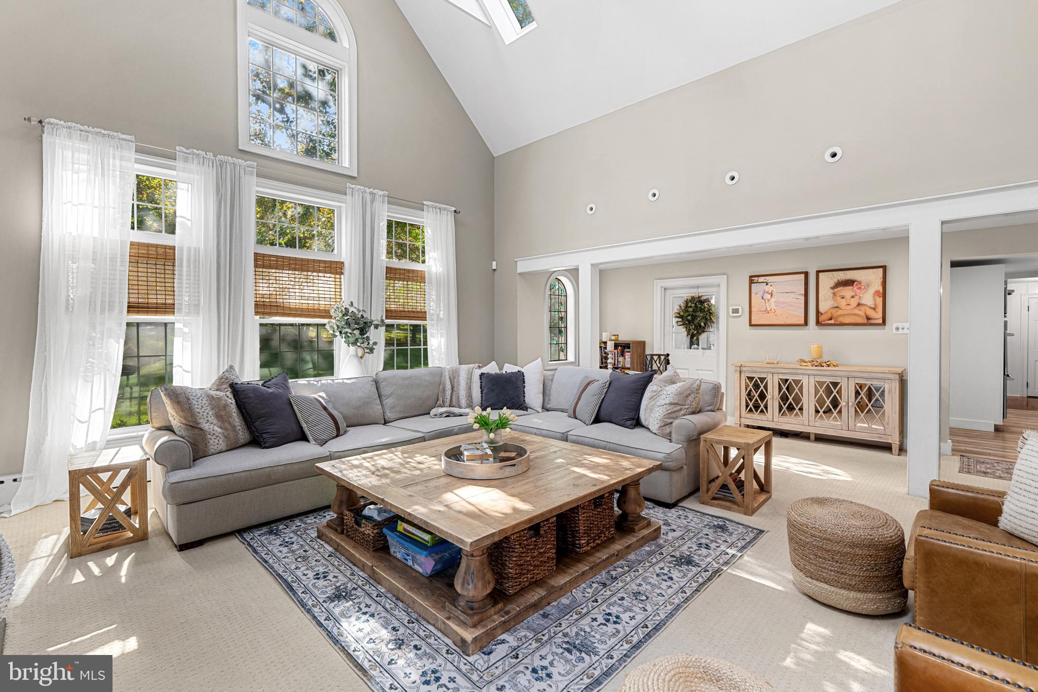 1141 Lafayette Road Wayne, PA 19087 - Photo 14 of 64 a living room with furniture a rug and a large window