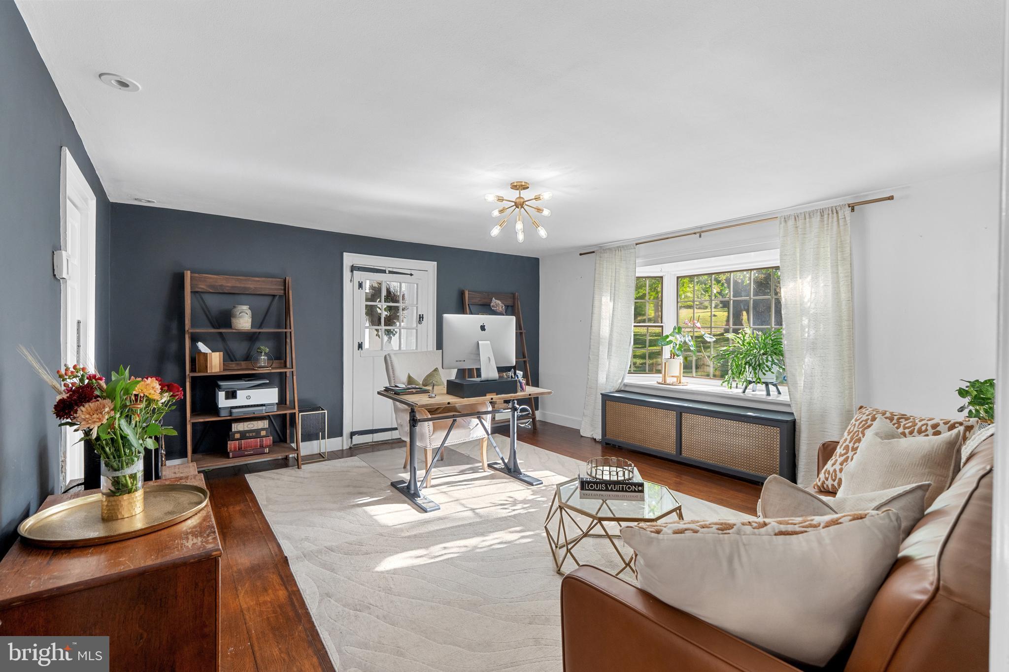 1141 Lafayette Road Wayne, PA 19087 - Photo 15 of 64 a living room with furniture and a potted plant