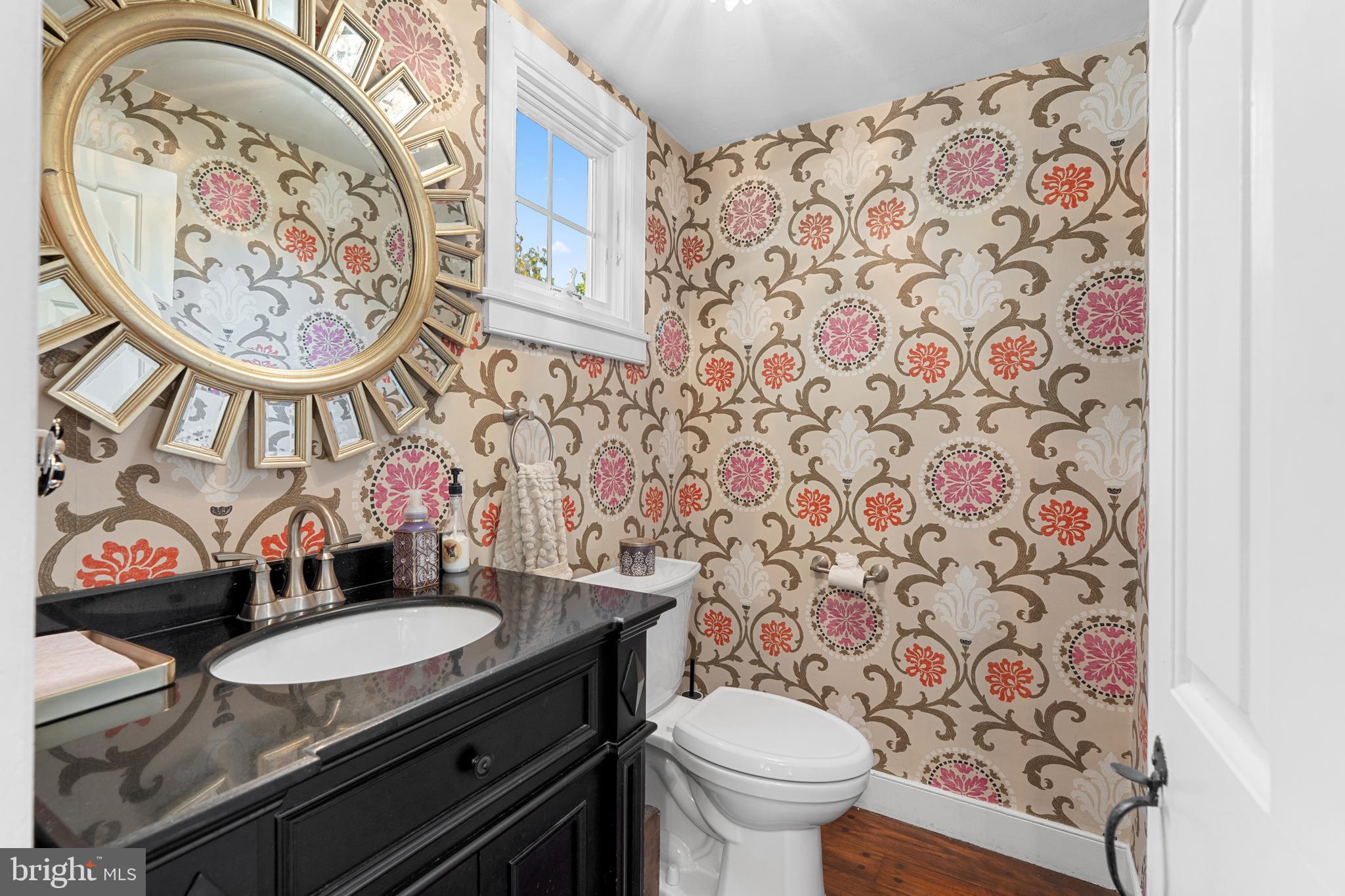 1141 Lafayette Road Wayne, PA 19087 - Photo 17 of 64 a bathroom with a sink a toilet and a mirror