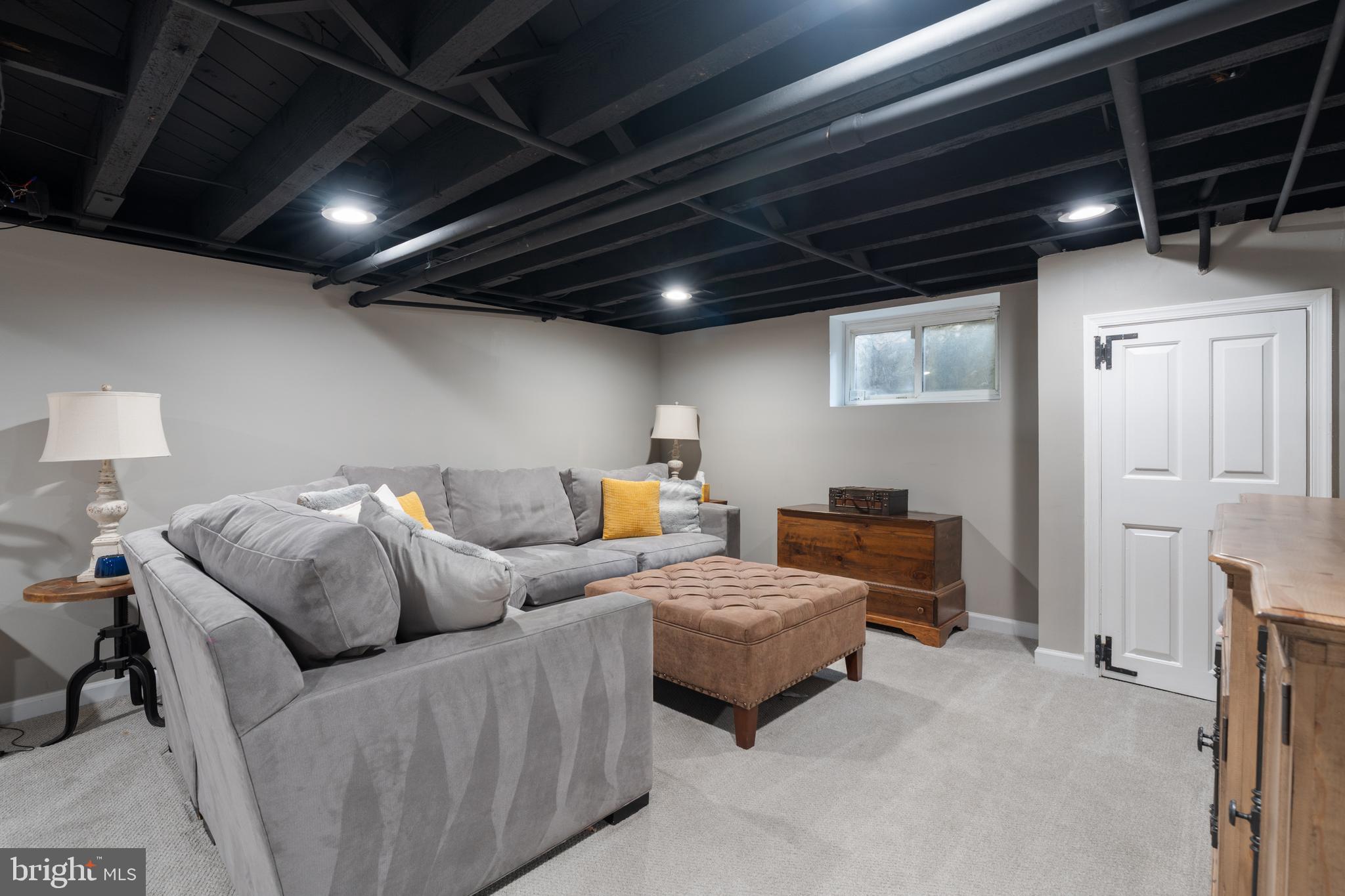 1141 Lafayette Road Wayne, PA 19087 - Photo 42 of 64 a living room with furniture and a flat screen tv