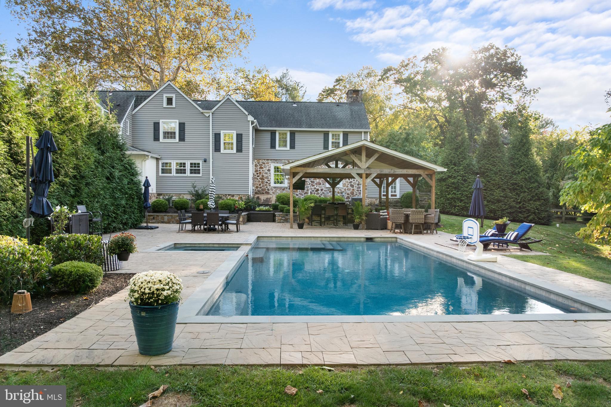 1141 Lafayette Road Wayne, PA 19087 - Photo 44 of 64 a view of a house with sitting area and swimming pool