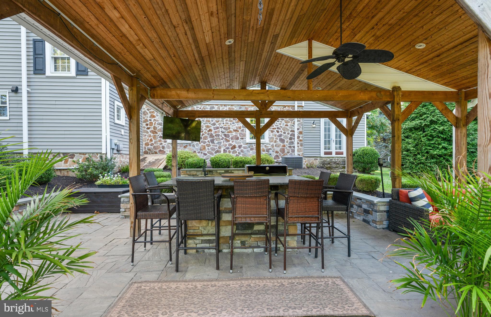 1141 Lafayette Road Wayne, PA 19087 - Photo 47 of 64 a view of a patio with a table and chairs