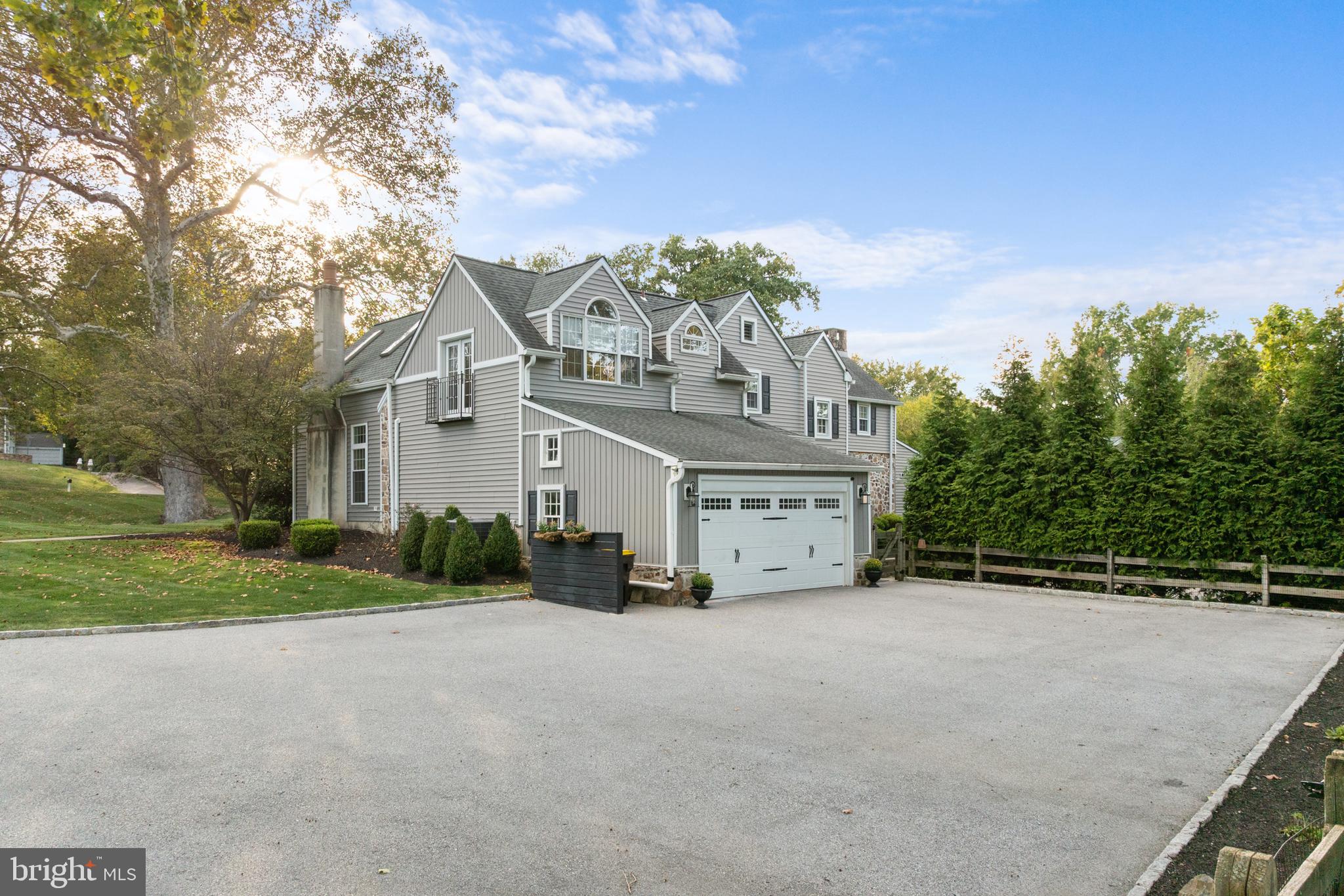 1141 Lafayette Road Wayne, PA 19087 - Photo 51 of 64 a view of a house with a yard and large trees