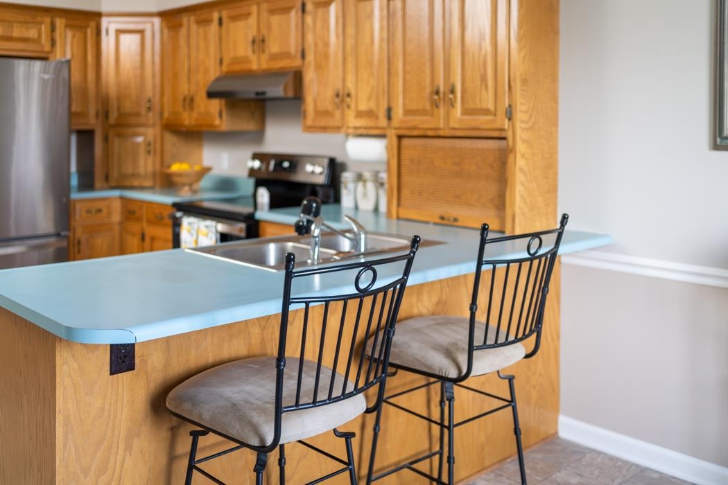 88 Cranberry Drive Stuarts Draft, VA 24477 - Photo 24 of 67 a view of a dining room with furniture and a window