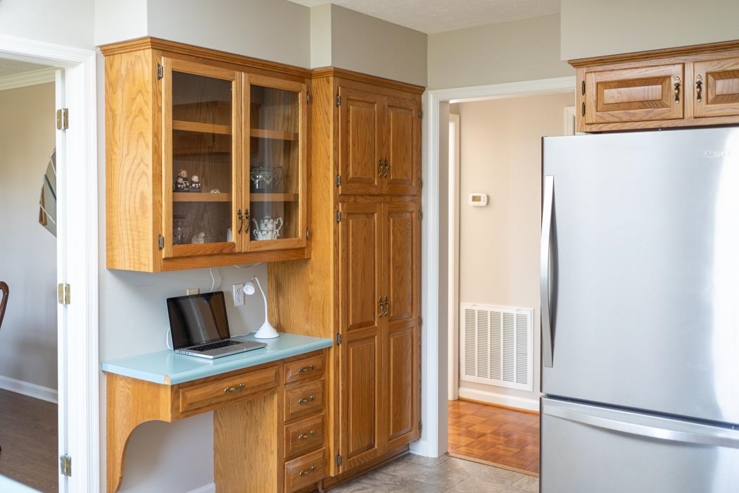 88 Cranberry Drive Stuarts Draft, VA 24477 - Photo 26 of 67 a kitchen that has a refrigerator and a stove top oven