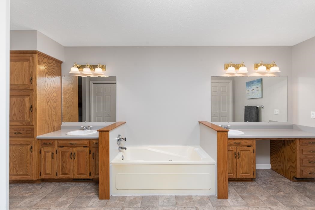 88 Cranberry Drive Stuarts Draft, VA 24477 - Photo 39 of 67 a bathroom with a sink and a mirror