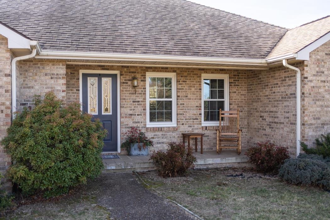 88 Cranberry Drive Stuarts Draft, VA 24477 - Photo 52 of 67 a front view of a house with garden