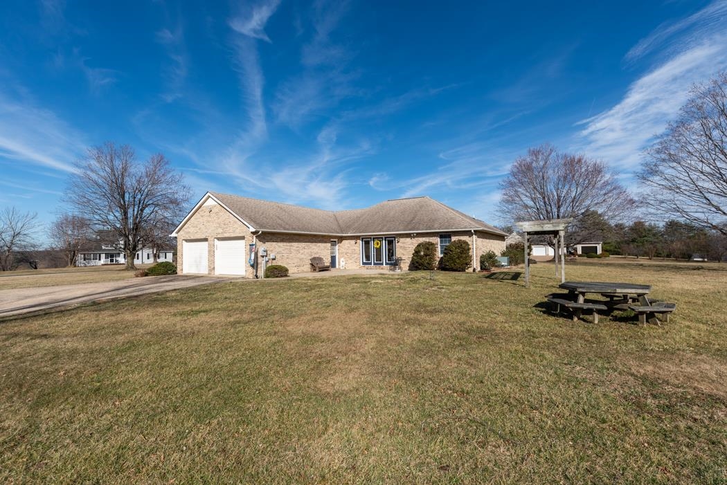 88 Cranberry Drive Stuarts Draft, VA 24477 - Photo 54 of 67 a view of a house with yard and sitting area