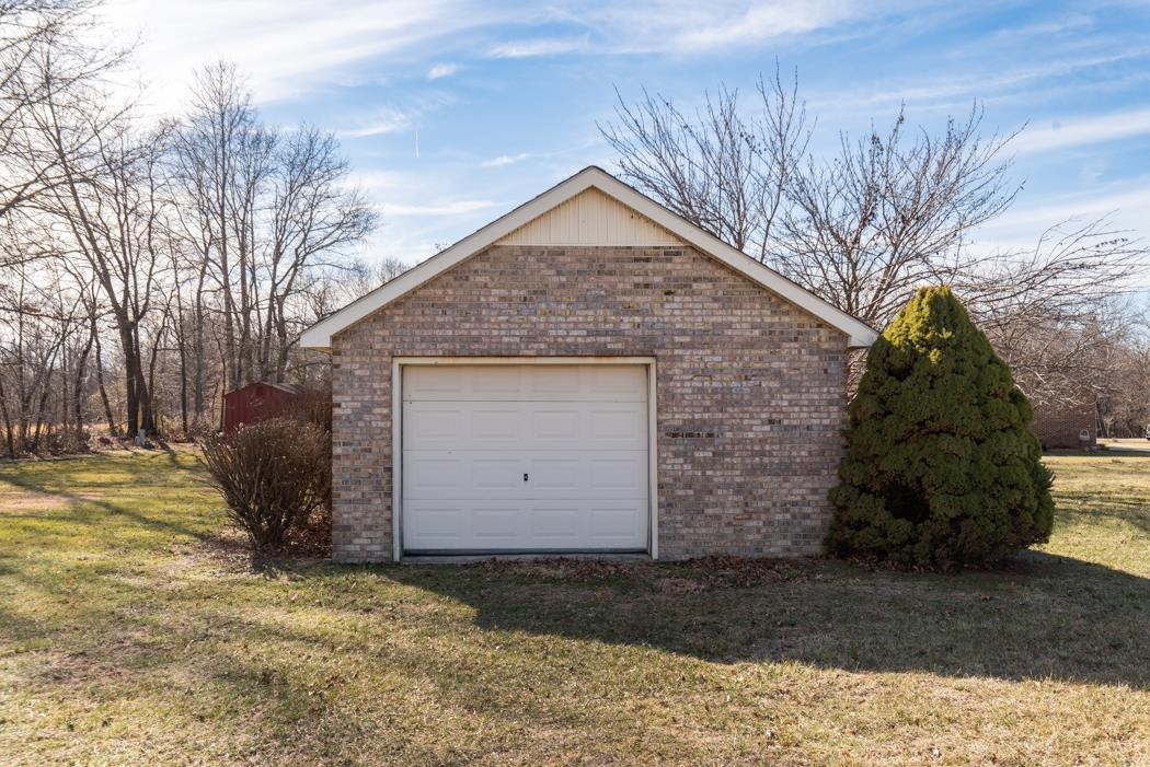 88 Cranberry Drive Stuarts Draft, VA 24477 - Photo 57 of 67 a view of a house with a yard and garage
