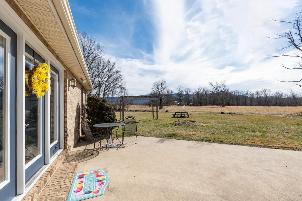 88 Cranberry Drive Stuarts Draft, VA 24477 - Photo 58 of 67 a view of swimming pool with a table and chairs