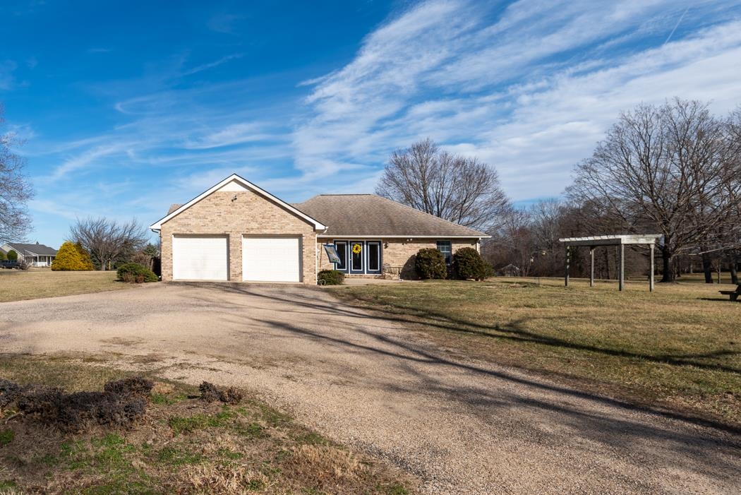 88 Cranberry Drive Stuarts Draft, VA 24477 - Photo 8 of 67 a front view of a house with a yard