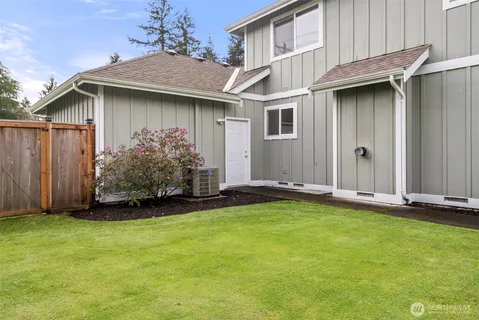 a house with garden in front of it