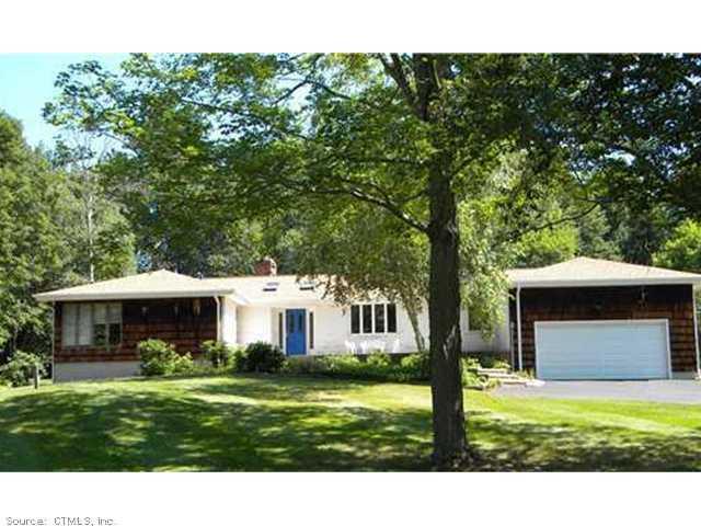 23 Sunbrook Road Woodbridge, CT 06525 - Photo 1 of 1 a view of house with backyard space and garden