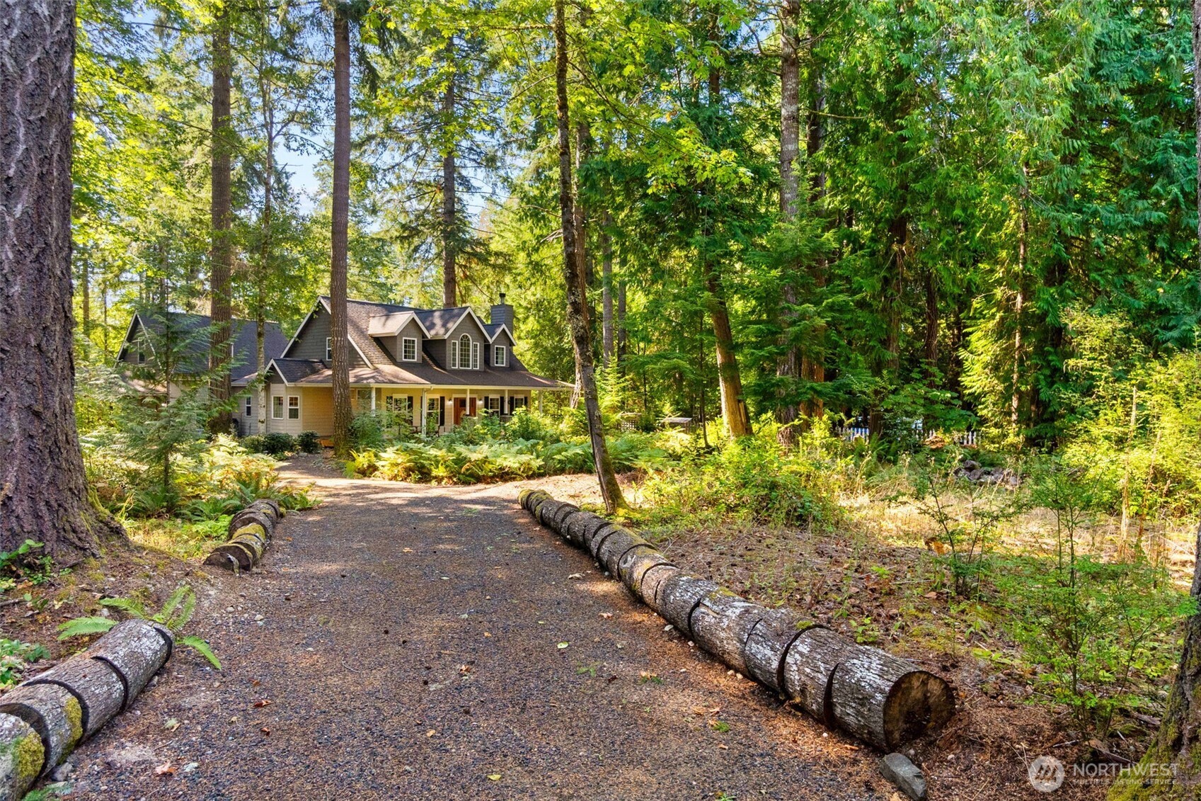 1130 East Sunset Hill Road Shelton, WA 98584 - Photo 4 of 40 a pathway of a house with a yard
