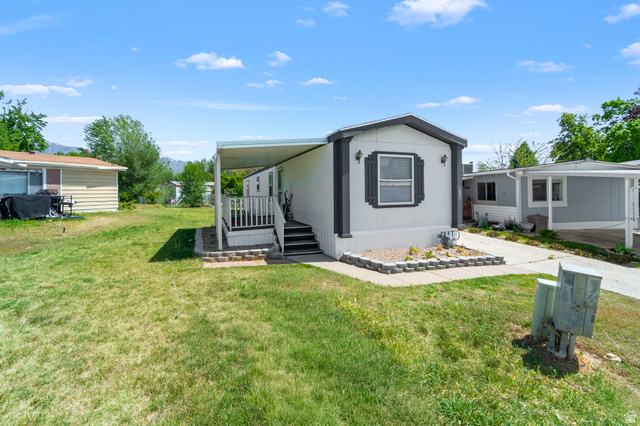 2600 North Hill Field Road, Unit 103A Layton, UT 84041 - Photo 25 of 31 Single-story manufactured home featuring a light-toned exterior with dark trim