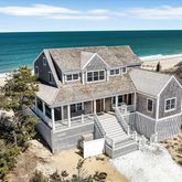 a view of a house with a ocean view