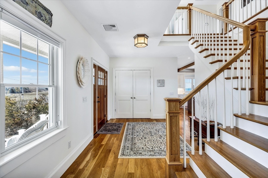 57 Salt Marsh Road Sandwich, MA 02537 - Photo 26 of 41 a view of entryway with wooden floor and stairs