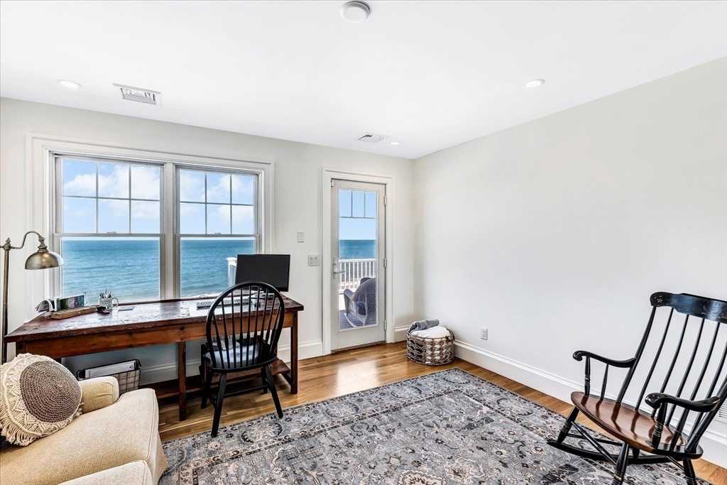 57 Salt Marsh Road Sandwich, MA 02537 - Photo 29 of 41 a bedroom with furniture and a window