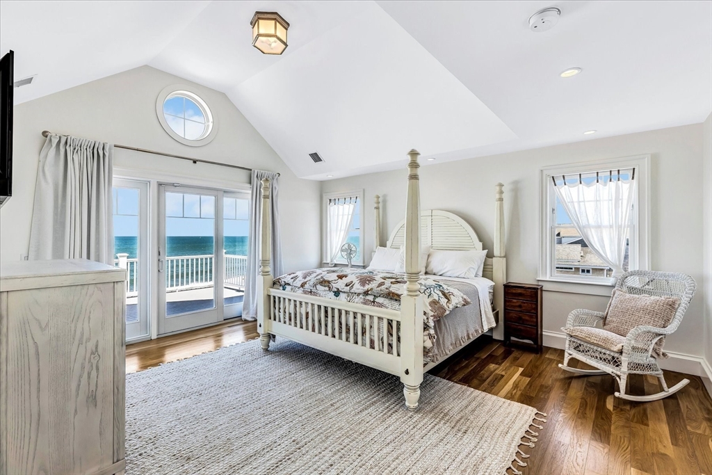 57 Salt Marsh Road Sandwich, MA 02537 - Photo 30 of 41 a bedroom with a bed and a window