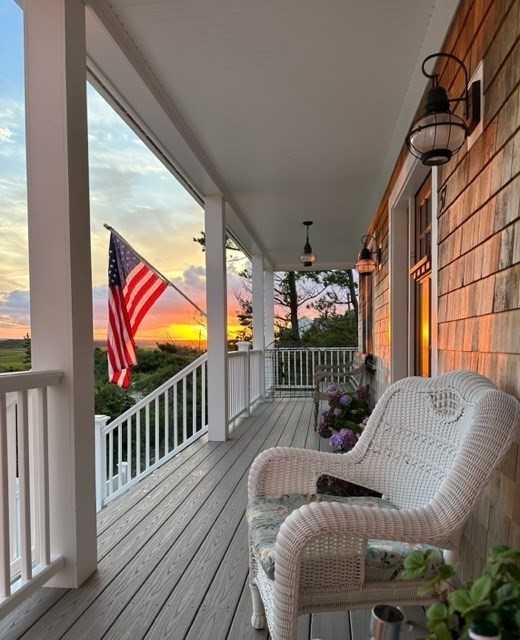 57 Salt Marsh Road Sandwich, MA 02537 - Photo 39 of 41 a balcony with furniture and window