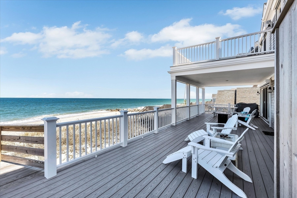 57 Salt Marsh Road Sandwich, MA 02537 - Photo 4 of 41 a view of a chairs and table on the wooden floor