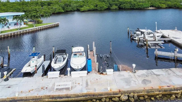 an aerial view of a house with outdoor space