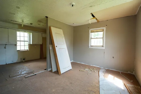 an empty room with windows