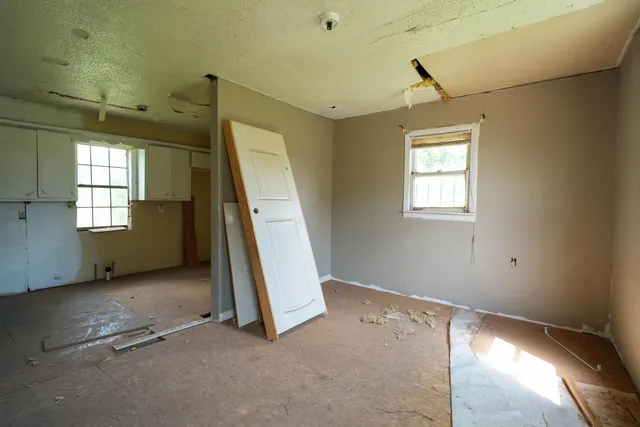 an empty room with windows