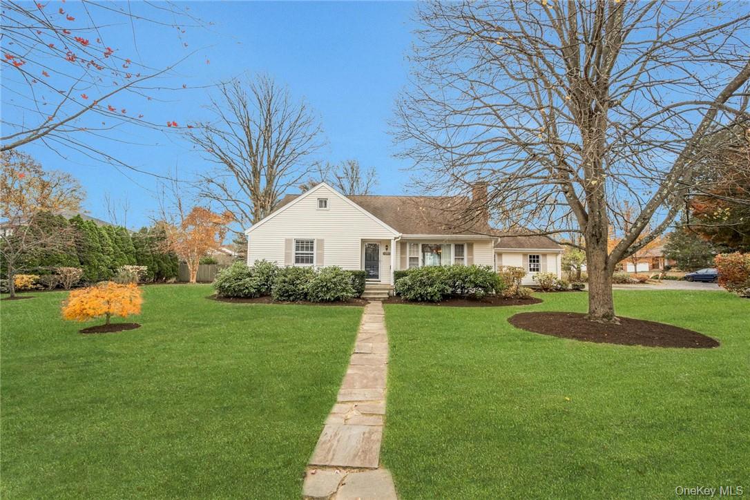 29 Old Orchard Road Rye Brook, NY 10573 - Photo 2 of 32 a front view of a house with garden