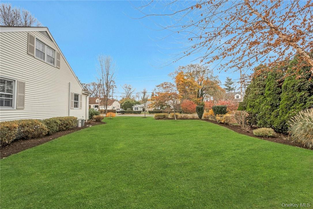 29 Old Orchard Road Rye Brook, NY 10573 - Photo 24 of 32 a view of yard with fountain and large trees
