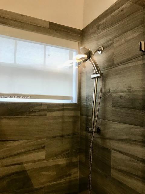 3356 Bird Avenue, Unit 10 Miami, FL 33133 - Photo 14 of 25 a bathroom with a shower