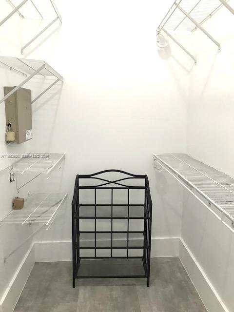 3356 Bird Avenue, Unit 10 Miami, FL 33133 - Photo 17 of 25 a bathroom with a sink toilet and mirror