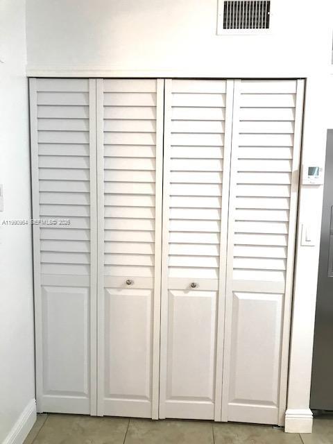 3356 Bird Avenue, Unit 10 Miami, FL 33133 - Photo 7 of 25 a view of a closet area with an empty room