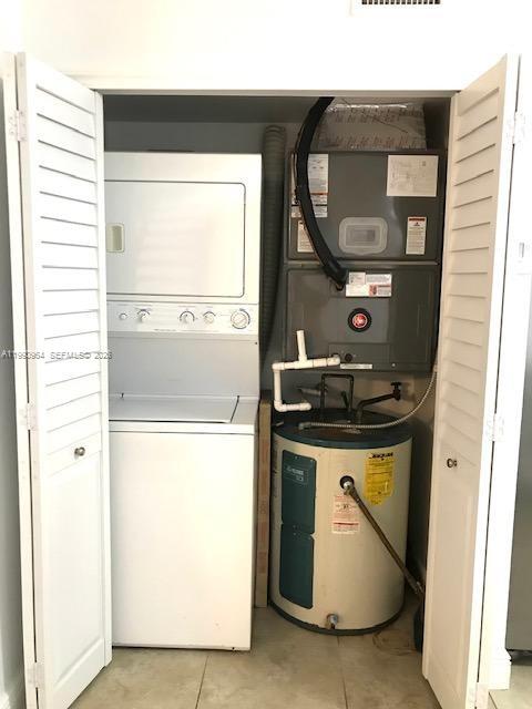 3356 Bird Avenue, Unit 10 Miami, FL 33133 - Photo 8 of 25 a utility room with dryer and washer