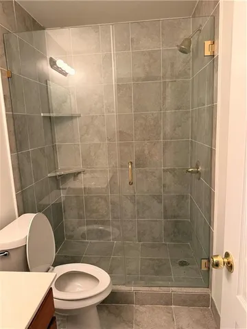 a spacious bathroom with a double vanity sink mirror and double