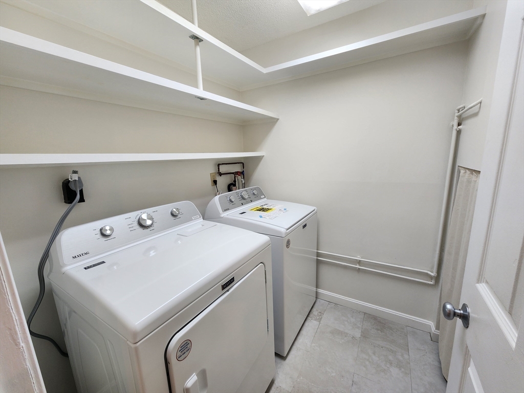 17 Beal's Cove Road, Unit A Hingham, MA 02043 - Photo 13 of 31 a utility room with dryer and washer