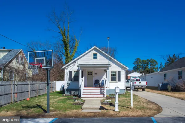 a front view of a house with a porch