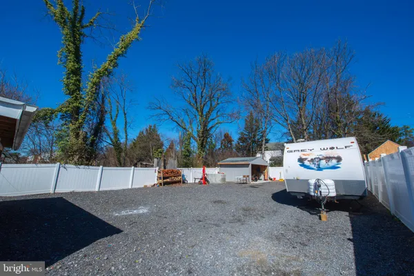 a view of street with parked cars