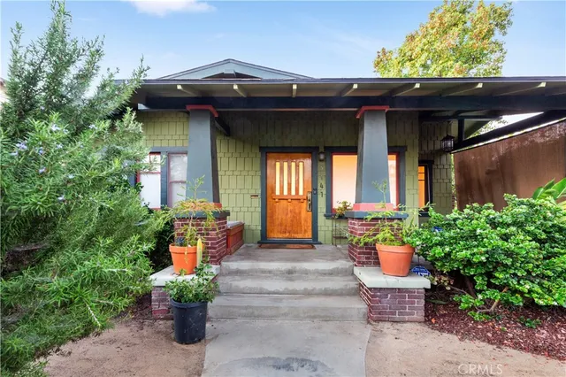 a front view of a house with patio