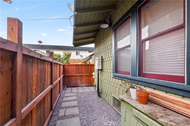 a view of a door and wooden floor
