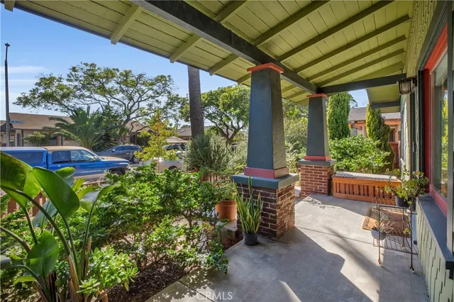 a house view with a sitting space and garden view