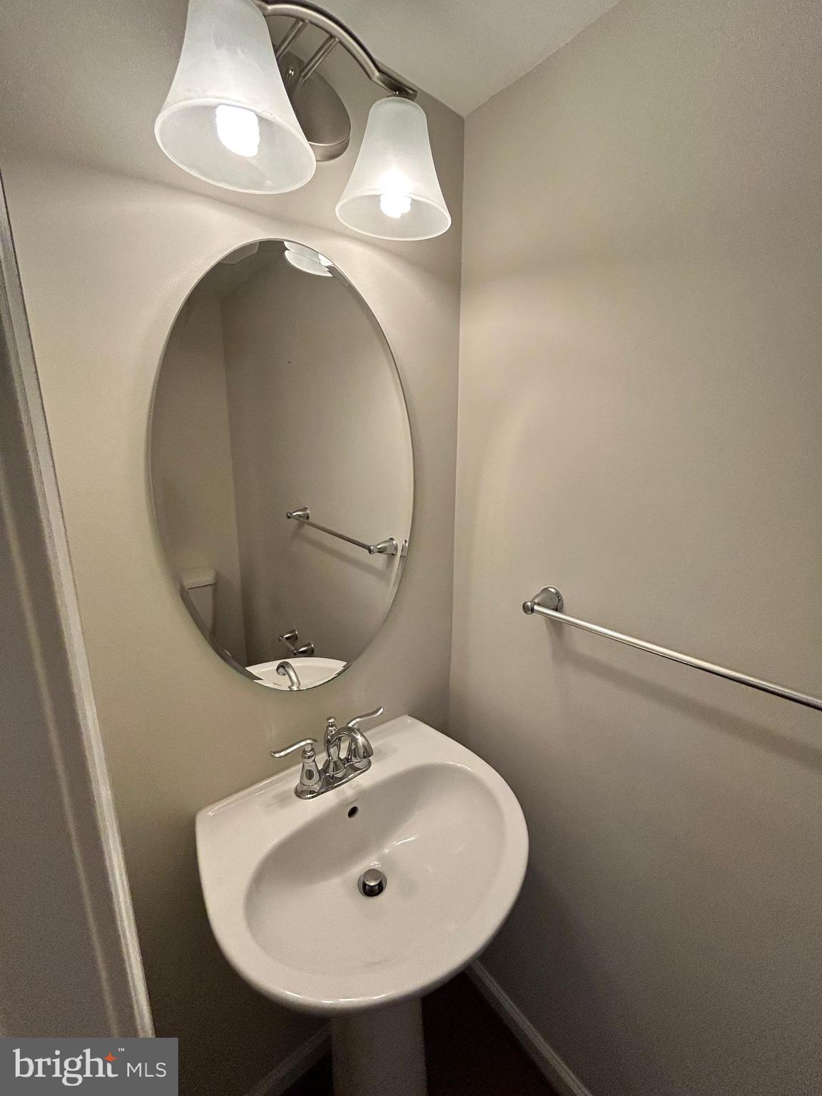 6170 Willow Place Bealeton, VA 22712 - Photo 4 of 28 a bathroom with a sink and mirror