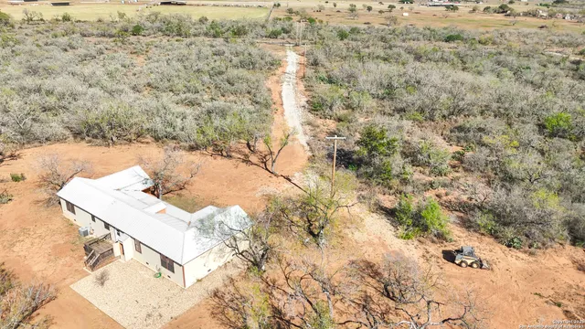 a view of residential space with wooden fence