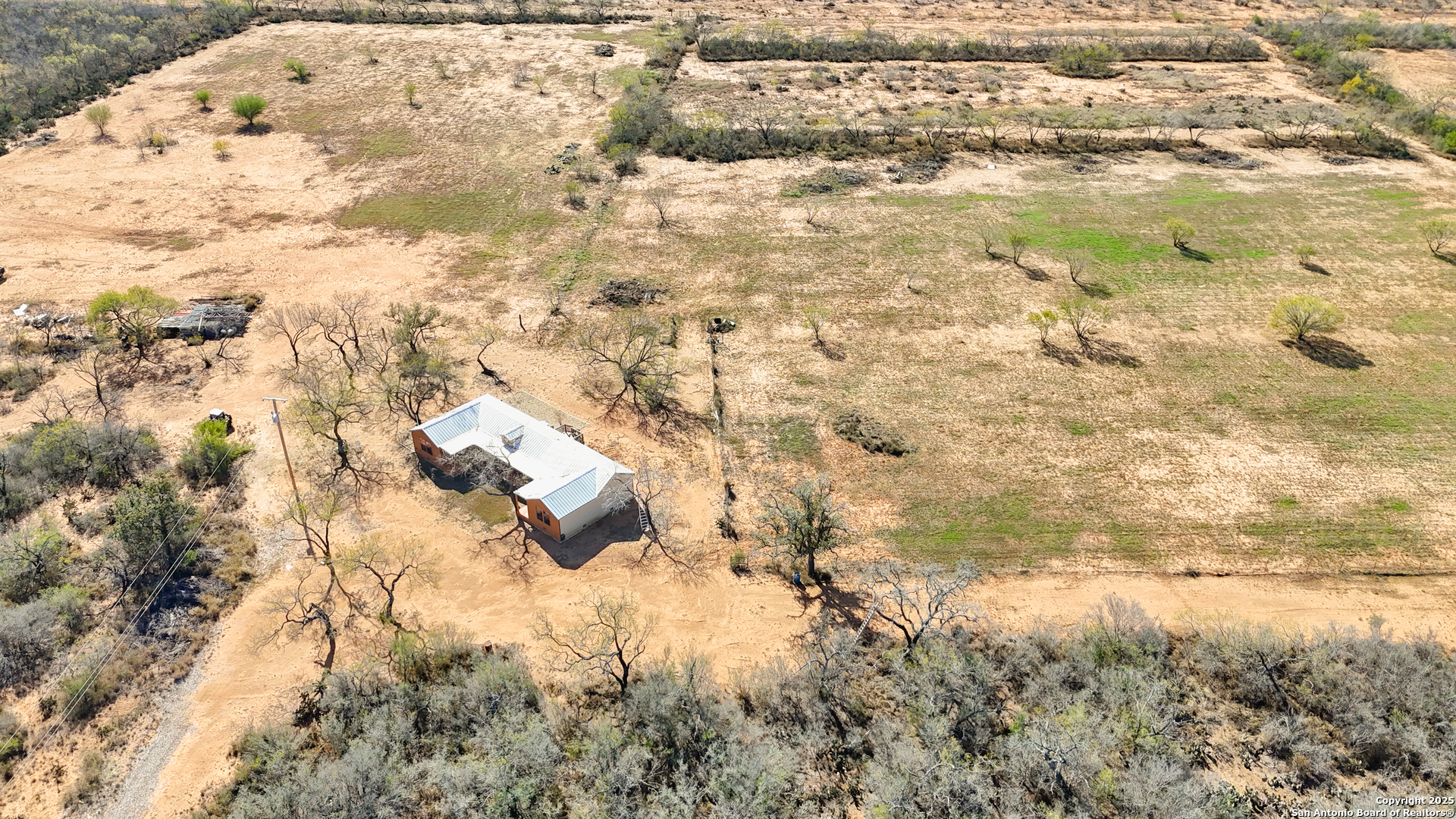 12-acres County Rd 307 Jourdanton, TX 78026 - Photo 4 of 8 a view of residential space with wooden fence