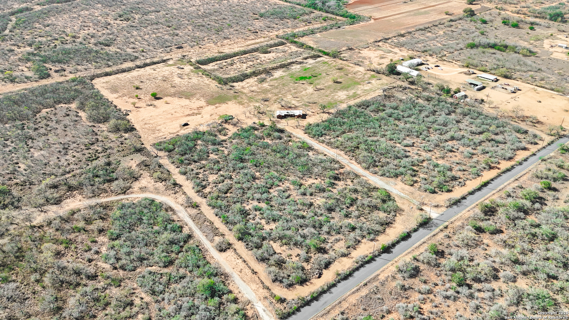 12-acres County Rd 307 Jourdanton, TX 78026 - Photo 5 of 8 view of a tree with a yard