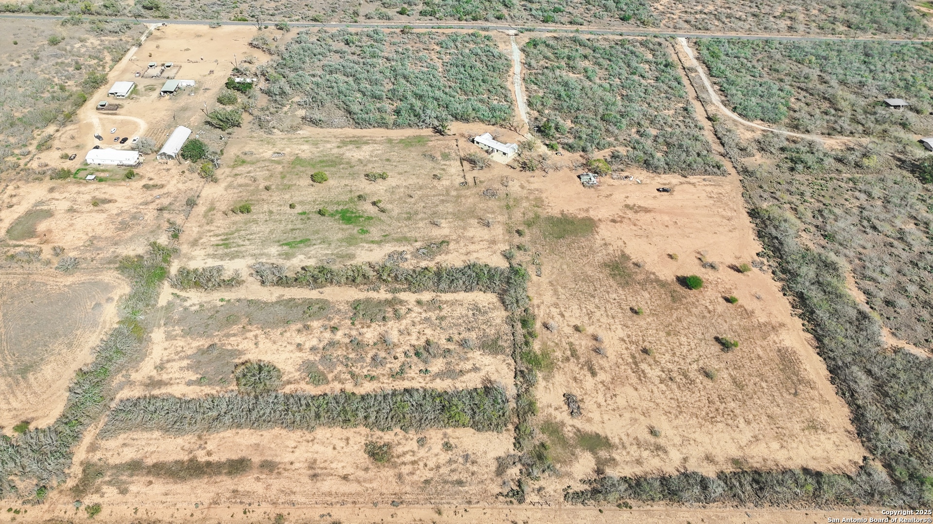 12-acres County Rd 307 Jourdanton, TX 78026 - Photo 7 of 8 a view of a yard in the yard