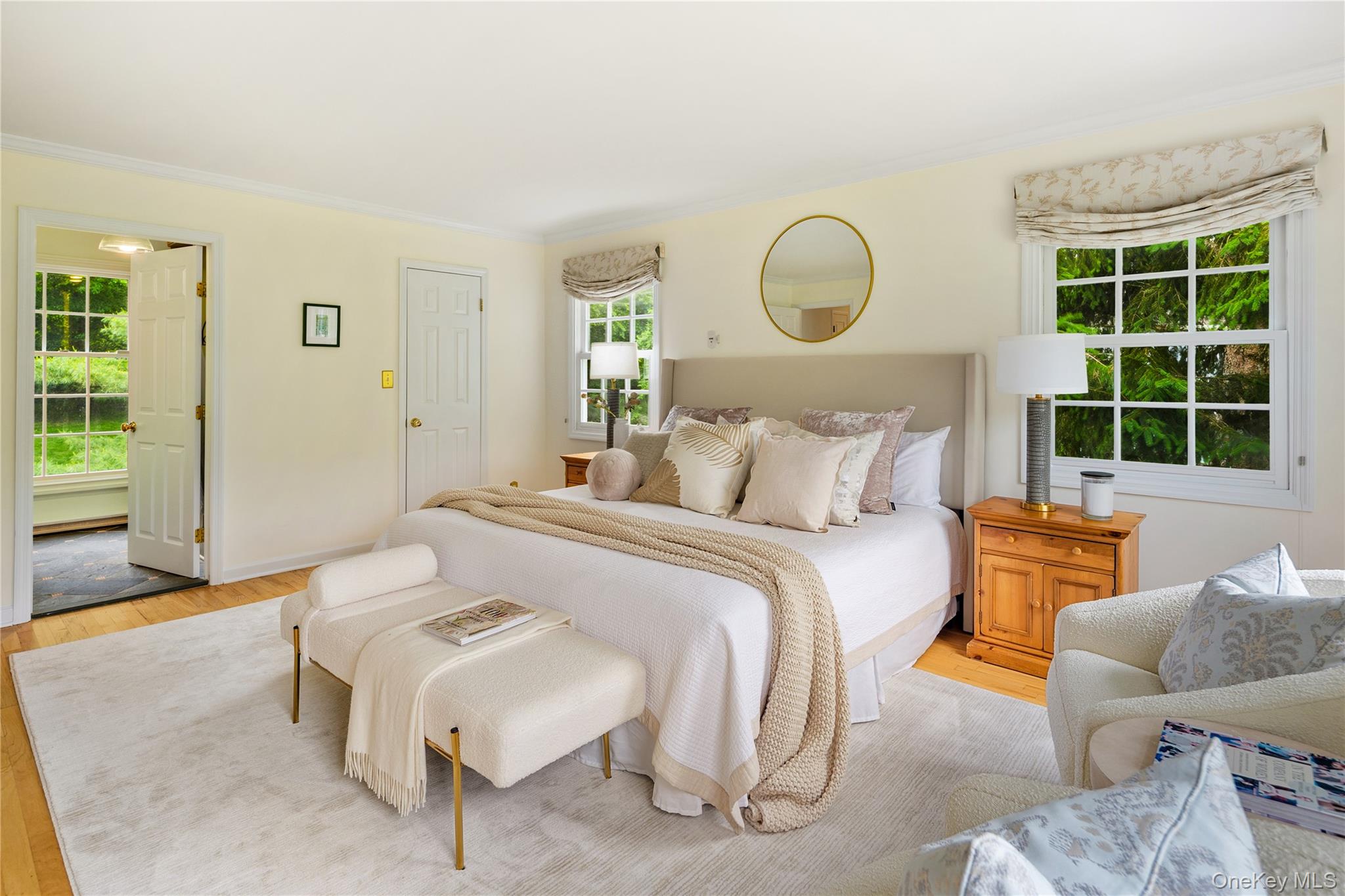 16 Fox Den Road Mount Kisco, NY 10549 - Photo 30 of 44 King size primary bedroom with door on left to on-suite renovated bath and door on right to large walk-in closet