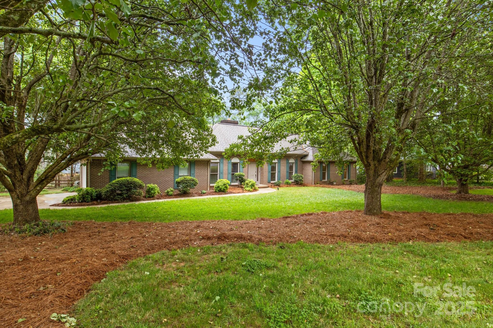 8368 Fairfield Forest Road Denver, NC 28037 - Photo 2 of 48 a view of a house with a yard