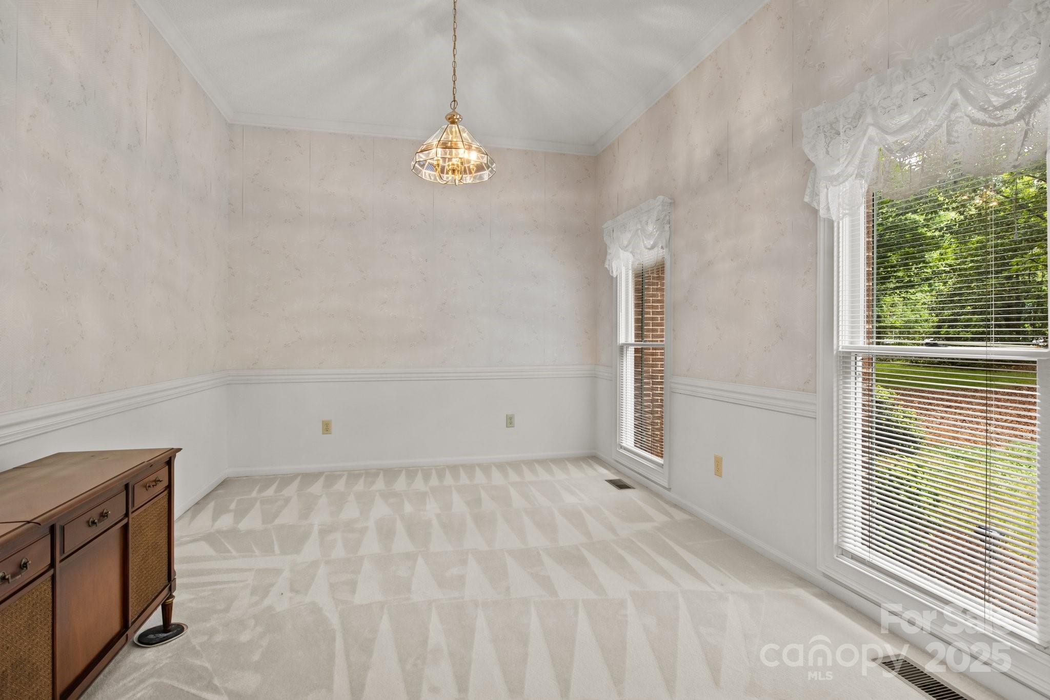 8368 Fairfield Forest Road Denver, NC 28037 - Photo 25 of 48 a view of an empty room with a window